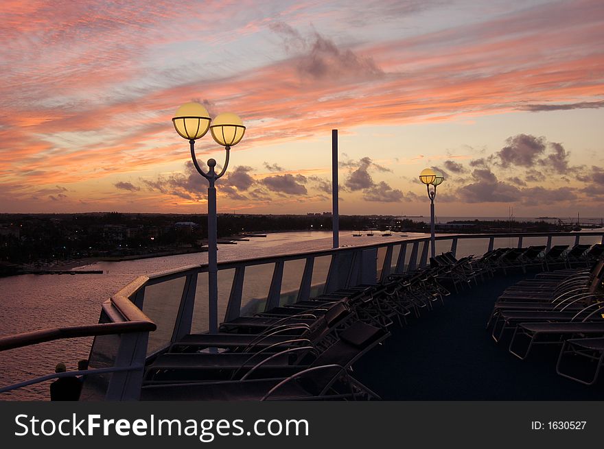 Sunset over Nassau, Bahamas taken from the deck of a cruise ship. Sunset over Nassau, Bahamas taken from the deck of a cruise ship.