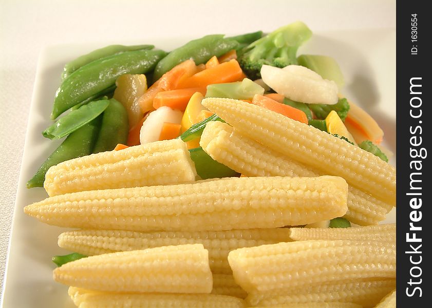 Variety of cooked vegetables on a plate, diet