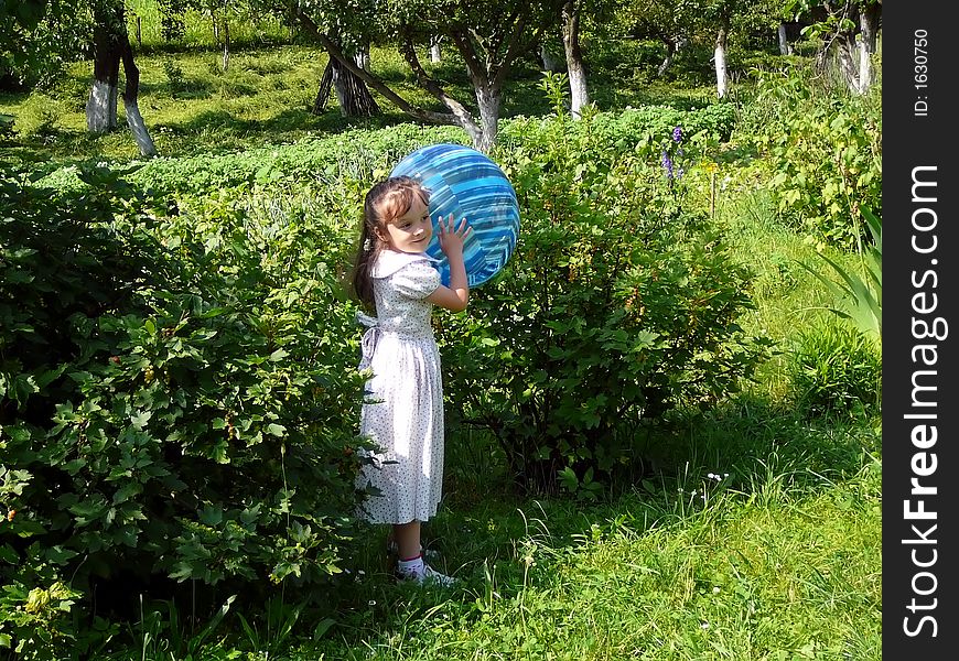 The girl with a ball. The girl with a ball