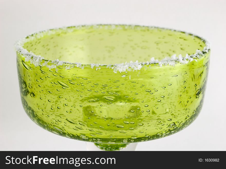 Margarita glass with salted rim. Margarita glass with salted rim