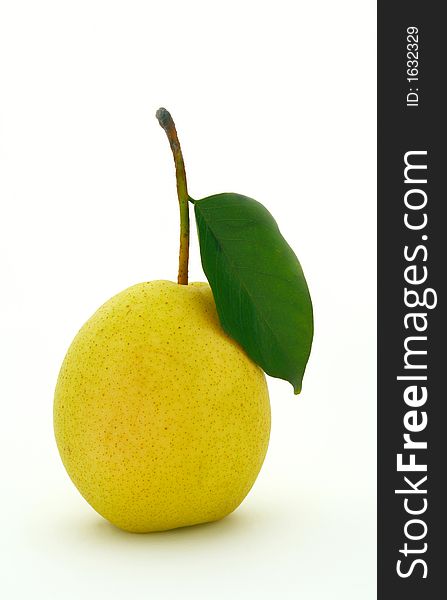 Yellow color pear with green leaf