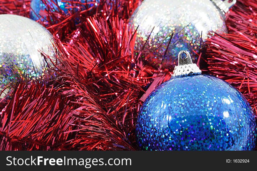 Close-up of blue silver and red christmas ornaments