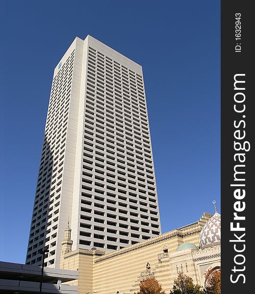 White granite skyscraper office agianst blue sky, Atlanta