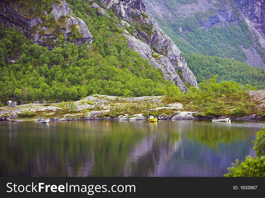 Photo of mountain lake in Norway, north of the Polar Circle