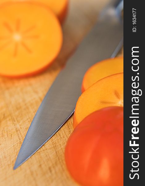 Close up of sliced persimmon fruits