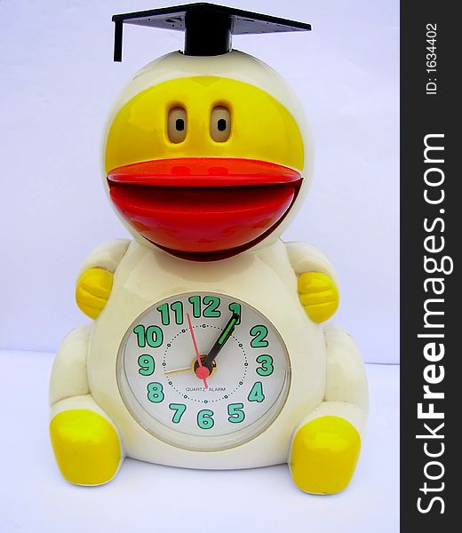 An duck alarm clock with white background close up