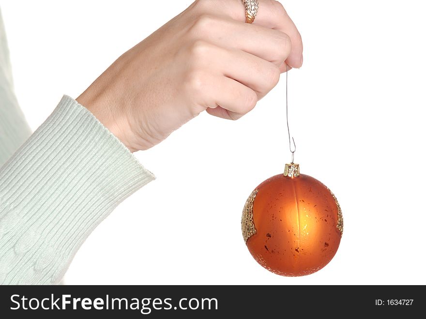 Woman holding a Christmas ornament