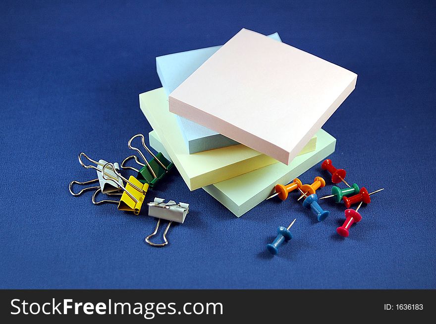 Photographed sticky notes of different colors.