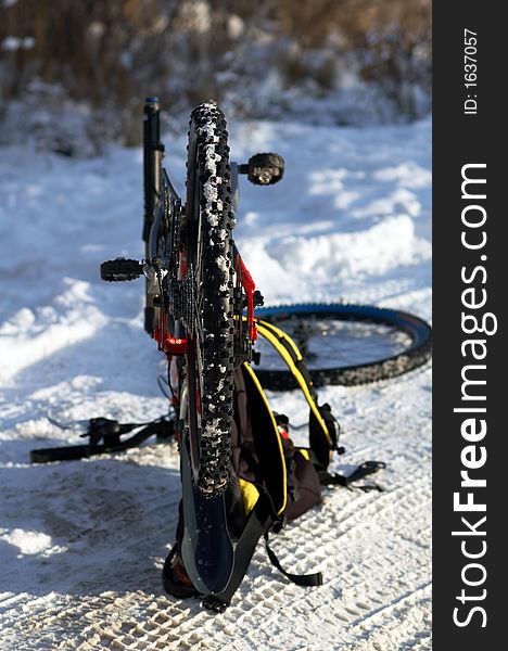 Crossover bicycle on snow road. Crossover bicycle on snow road