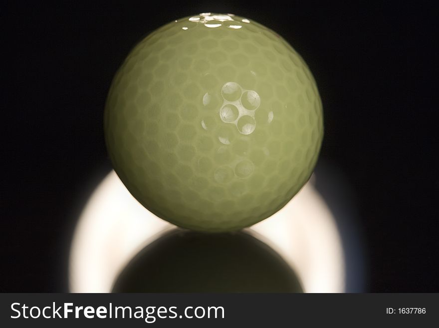 Picture Of Yellow Golf Ball Backlight On Glass