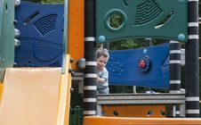Child In Playground Royalty Free Stock Photos