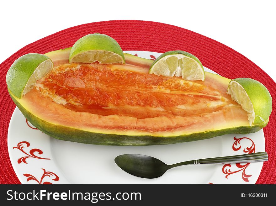 Sweet fruit ready to eat on a plate with a spoon. Sweet fruit ready to eat on a plate with a spoon.