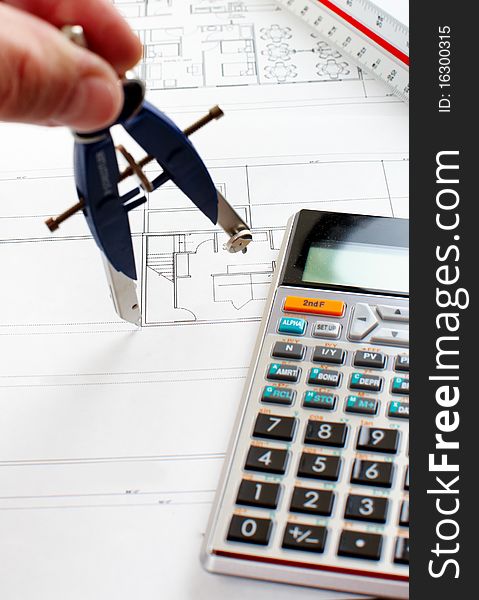 Technical drafting, calculator, construction drawing. The people of business