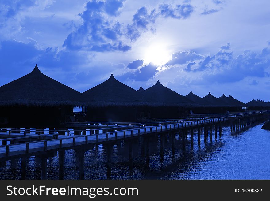 Water bungalows at night