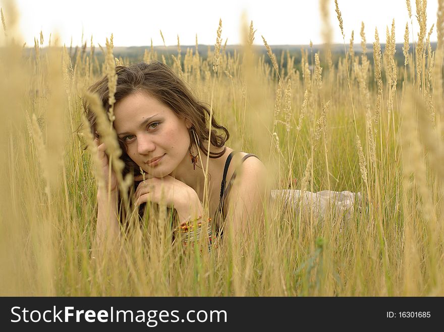 Girl Lying In The Corn Field