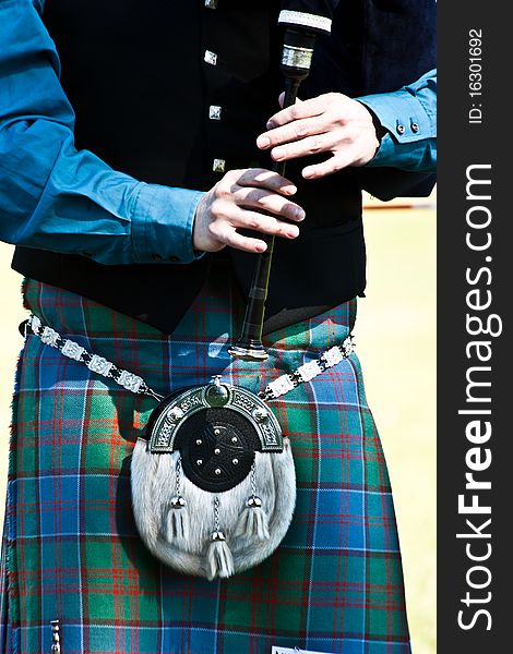 Detail of a bagpipe exibition during Highland Games. Detail of a bagpipe exibition during Highland Games
