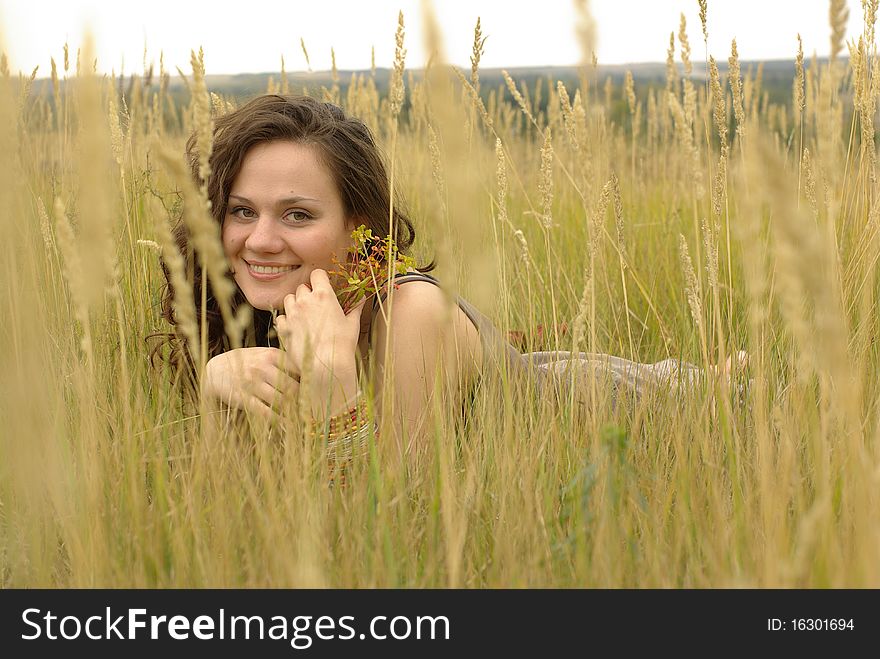 Girl lying in the grass