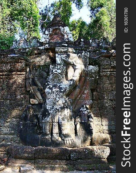 Giant garuda on the wall of the enclosure,Ta Prohm temple,Angkor,Cambodia