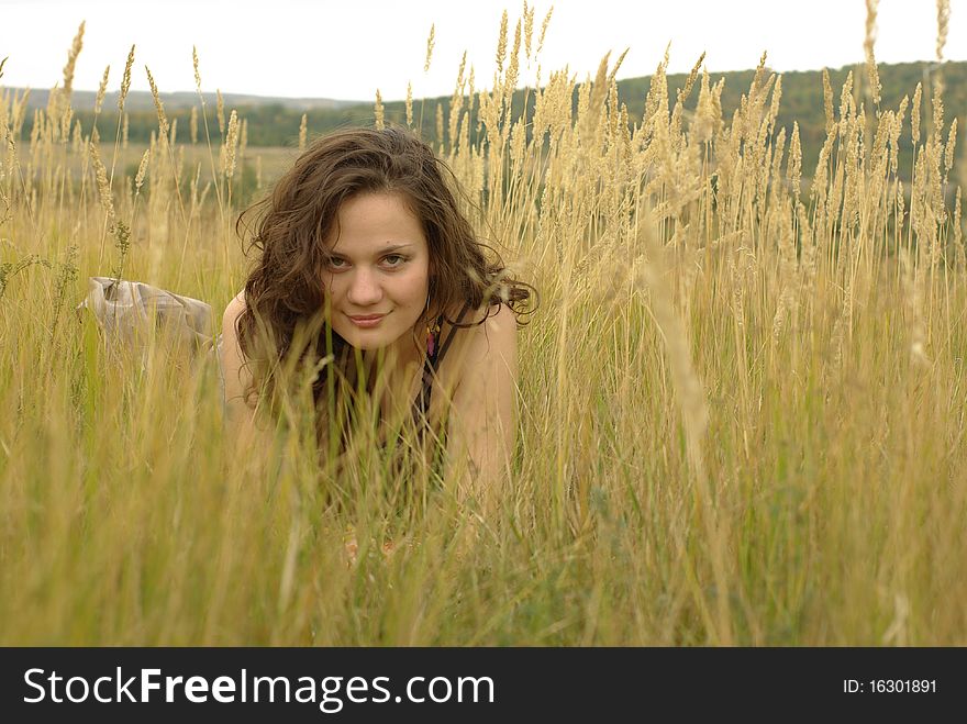 Girl Lying In Corn Field