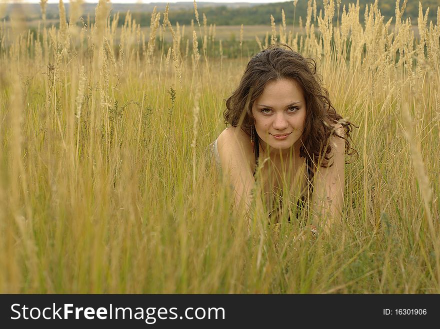 Girl Lying In Corn Field