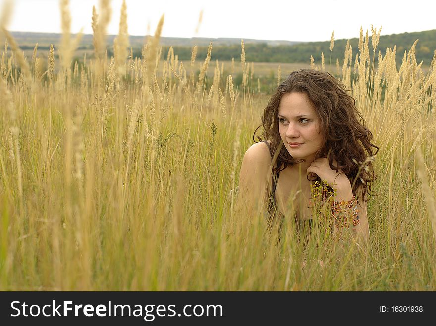 Girl praying in the autumn field. Girl praying in the autumn field
