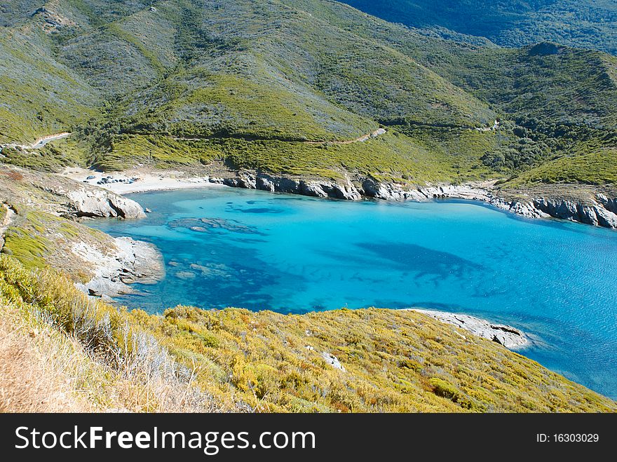 Beautiful Corsica creek with calm crystal clear sea. Beautiful Corsica creek with calm crystal clear sea