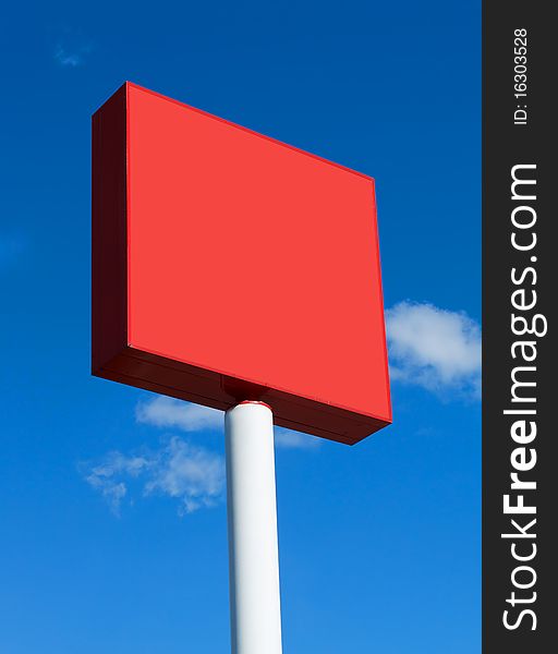 Red blank billboard on a sunny day