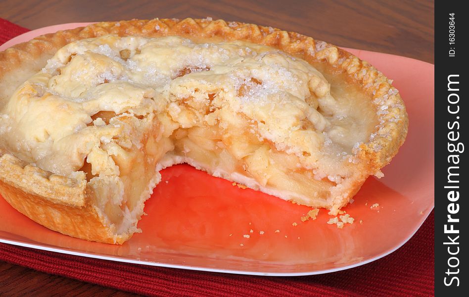 Sliced apple fruit pie on a platter. Sliced apple fruit pie on a platter