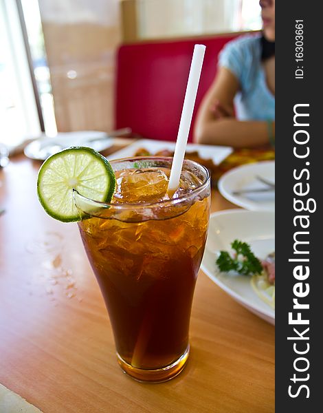 Lemon tea on the dining table at a restaurant