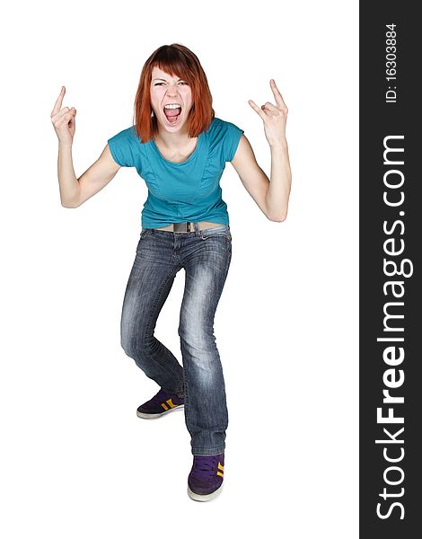 Young redhead girl shouting and making punk gesture, full body, isolated