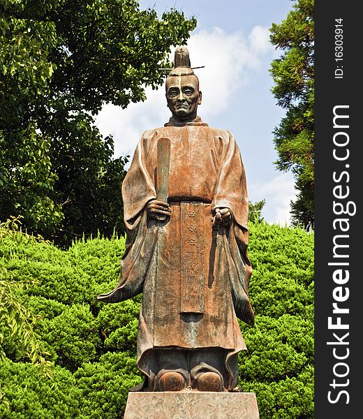 An old statue in a japanese park. An old statue in a japanese park