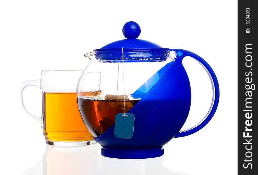 Transparent teapot with black tea bag
