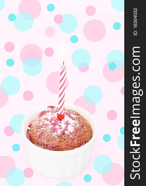 Cupcake and candle on the multicolored background. Cupcake and candle on the multicolored background
