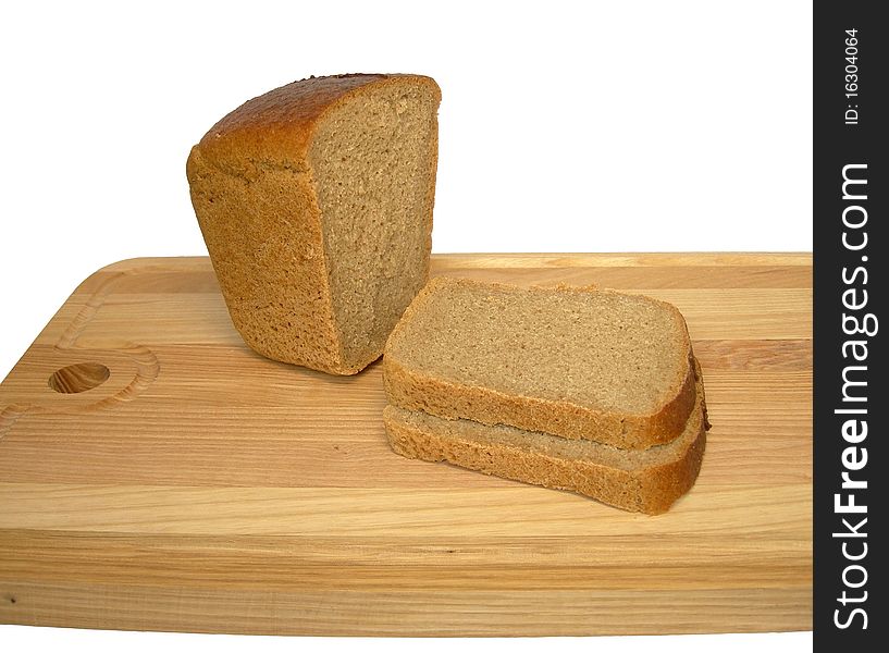 Bread Is On A Cutting Board.