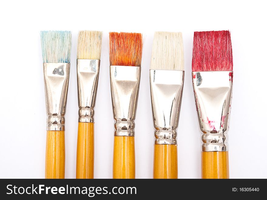 Paint brushes on white background