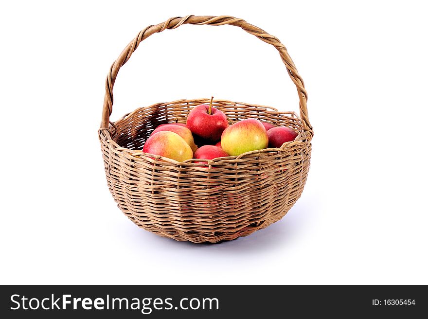 Basket of red and yellow apples on white background. Basket of red and yellow apples on white background