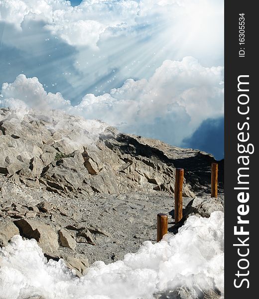 Mountainous path among the clouds that it arrives to the sky