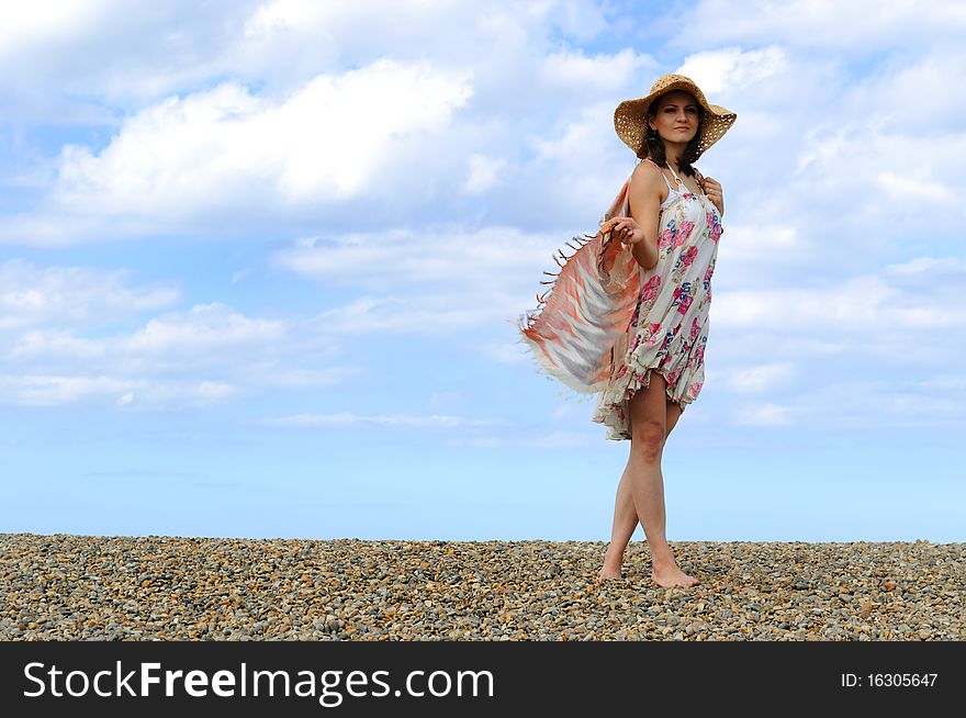 Young Woman On The Beach.