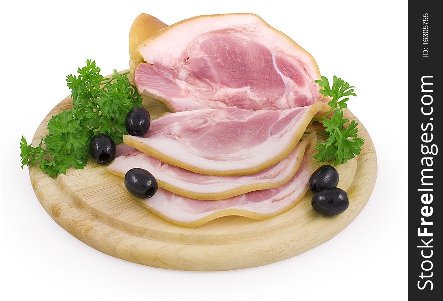 Nice fresh pink bacon with black olives and parsley isolated on white with clipping path