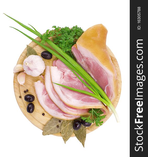 Nice fresh pink bacon with greens and spices isolated on white with clipping path. Nice fresh pink bacon with greens and spices isolated on white with clipping path