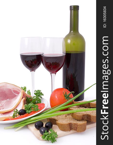 Nice fresh bacon, vegetables; greens, bread and red wine isolated on white with clipping path. Nice fresh bacon, vegetables; greens, bread and red wine isolated on white with clipping path