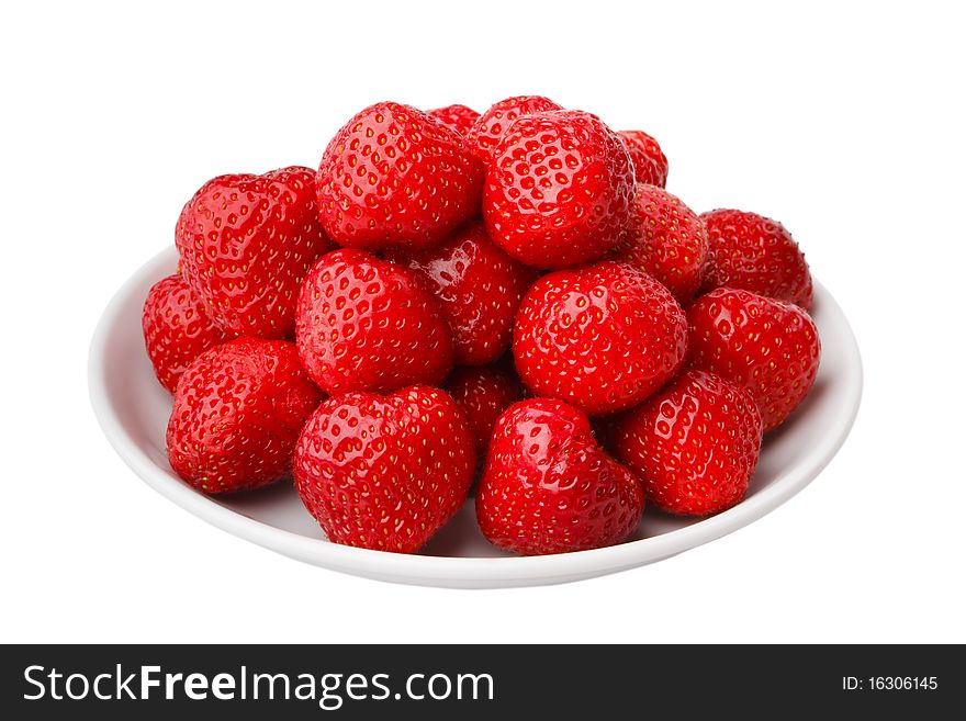 Strawberries on the plate ready for use ingredient isolated on white