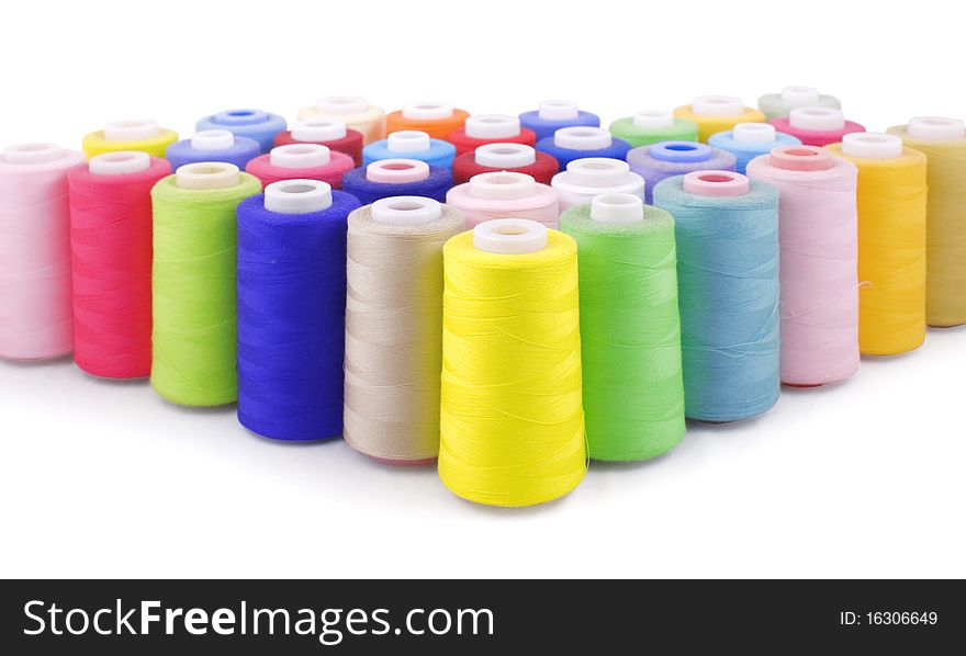 Colorful bobbins isolated on white with clipping path