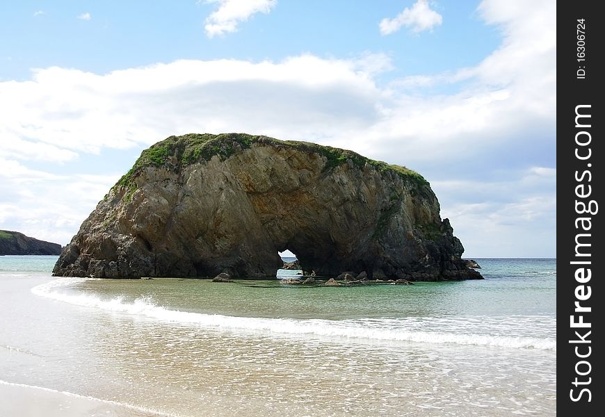 Rocky arch on spanish coast of Asturia