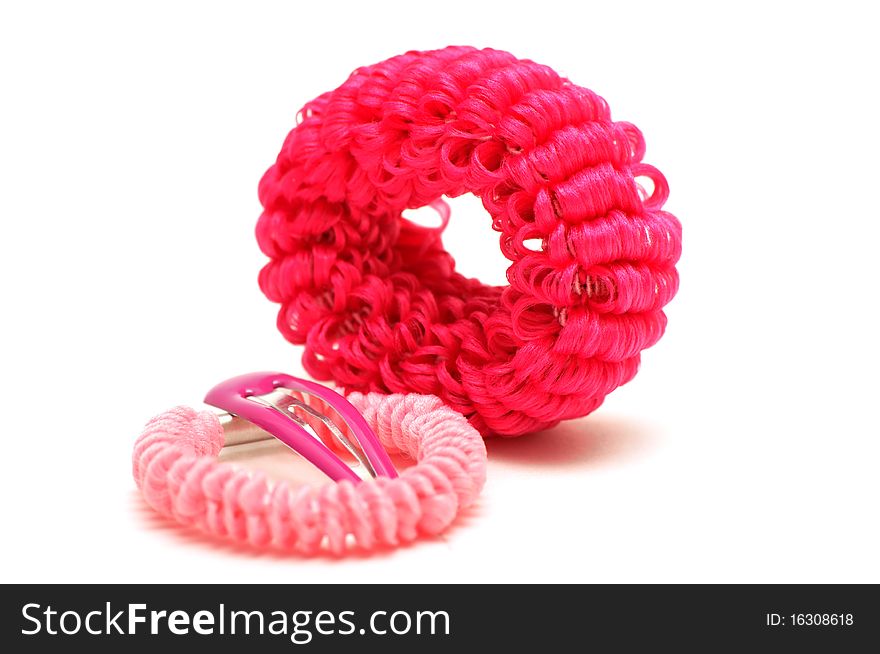 Hair bands and plastic hairclip isolated over white background