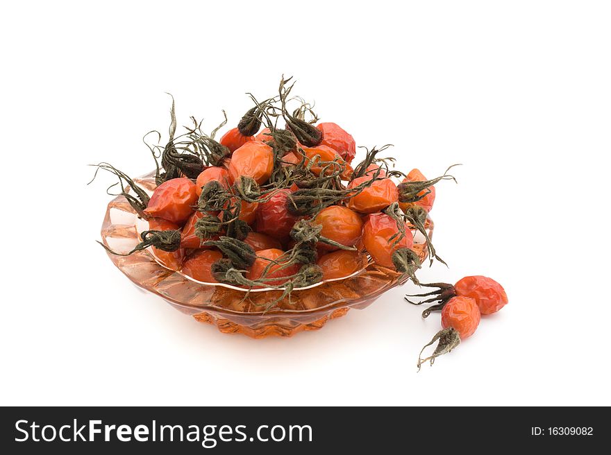 Pharmaceutical Dried tea rose on a white background. Pharmaceutical Dried tea rose on a white background.