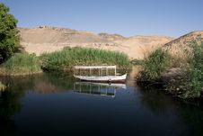 A Fisherman S Boat On A Lake In The Dessert Royalty Free Stock Photo A Fisherman S Boat On A Lake In The Dessert Royalty Free Stock Photo