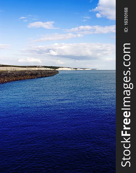 The Sussex coastline with cliffs and sea and marina. The Sussex coastline with cliffs and sea and marina