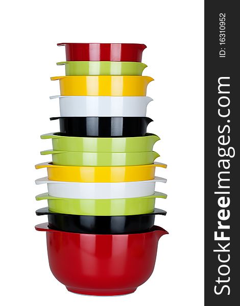 Colorful Kitchen  bowls stacked up  isolated in white background.