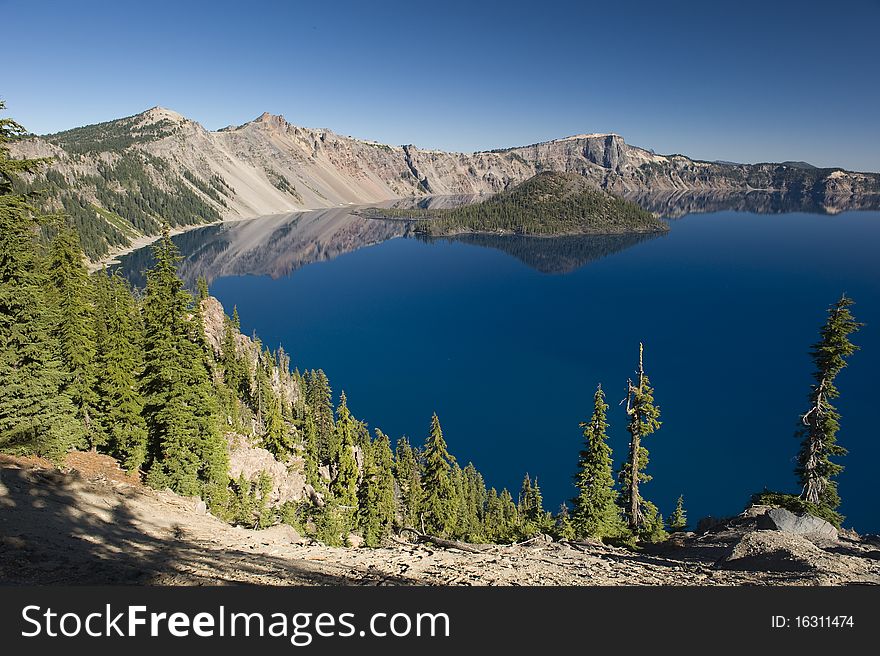 Wizard Island at Crater Lake Volcano in Oregon on a clear summer day.